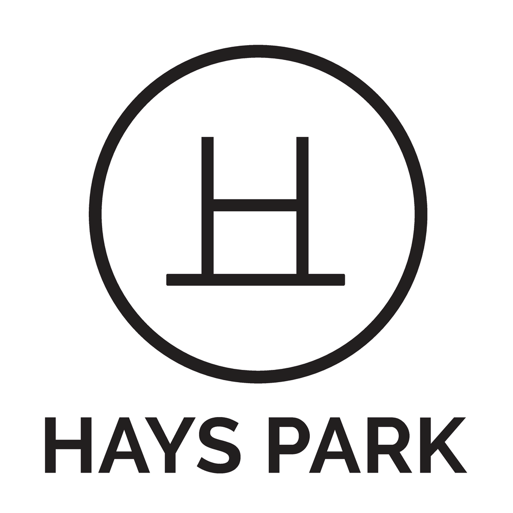 A black and white image of a sign for Hays Park.